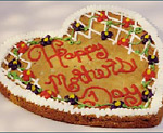 Der Schriftzug wurde aus dem Kuchen entfernt, das Bild Tonwert-korrigiert und nachgesch�rft